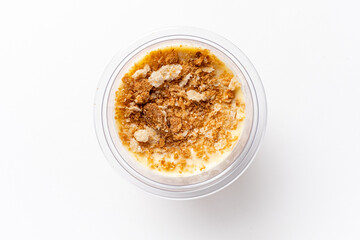 A yummy dessert with smooth layers and a crispy, golden crumble invites indulgence