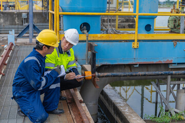 Environmental engineers work at wastewater treatment plants,Water supply engineering working at...