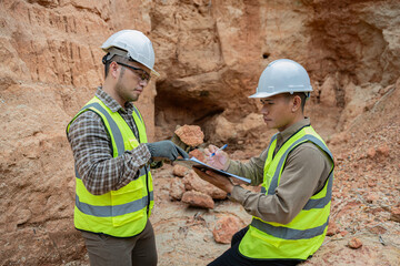 Geologist surveying mine,Explorers collect soil samples to look for minerals, A geologist is a...