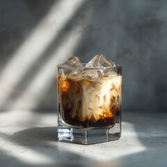 Minimalist iced coffee in a modern glass tumbler, perfectly chilled