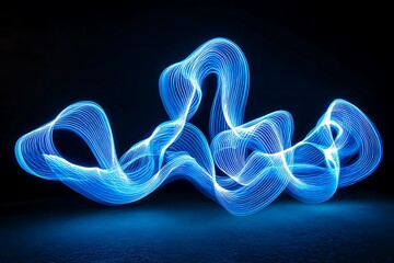Electric blue light trails swirl across a dark background, forming a stunning abstract light effect that conveys both movement and calm.