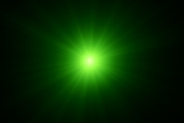 Glowing radiant green light burst on dark background with soft gradient and luminous center
