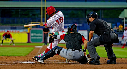 #18 catcher and baseball umpire