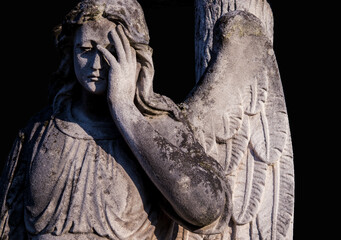 Abstract image with background and place for caption and fragment of tragic sad american angel and rays of sun and hope. Black and white concept.
