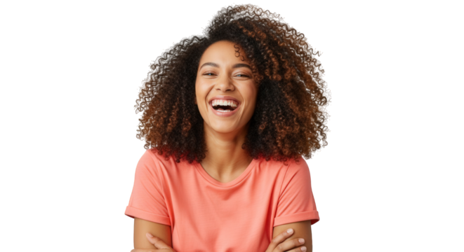 Stock photo of a joyful woman laughing with curly hair and a peach shirt on black background image on transparent background - Powered by Adobe
