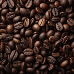 Naklejka premium Close-up view of many dark brown coffee beans