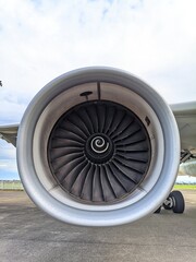 Close-up of airplane turbofan engine with fan blades	