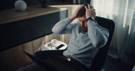 Stressed Financial Analyst Monitoring Exchange Market Charts and Real-Time Stocks Falling on...