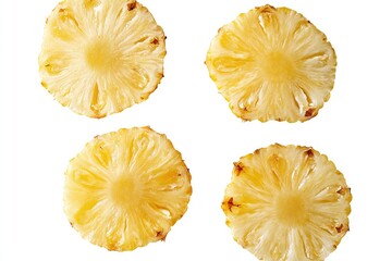Four circular pineapple slices, top view