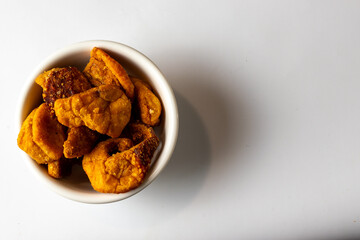 Traditional hungarian pork cracklings - crispy fired of rendered pork fat