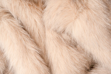 Texture of faux fur as a background, top view.