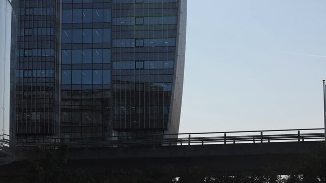 Copenhagen, Denmark An elevated Metro train on the M1 line passes the modern buildings in the Orestad district.  