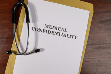 Medical Confidentiality Title on Legal Documents Set on Desk – Legal Concept