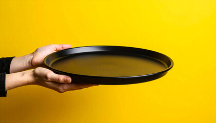Two Hands Holding Empty Black Tray