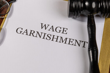 Wage Garnishment Title on Legal Documents Set on Desk – Legal Concept