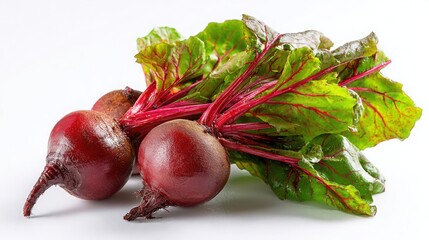Fresh red beetroots with green leaves on white background