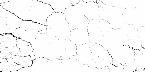 high contrast image showing a cracked white surface, creating a distressed and textured abstract pattern design element