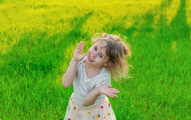 Child playing with ladybug. Selective focus.