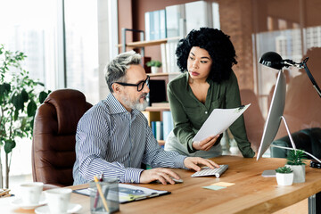 Professional business colleagues collaborating in modern office with inspiring discussions and teamwork