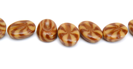 Caramel candies isolated on white background