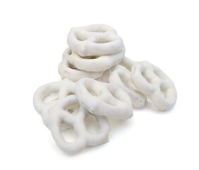 White chocolate covered pretzels on white background 