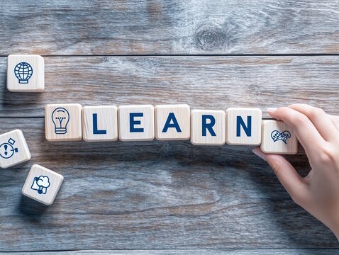 Lifelong Learning and Knowledge Acquisition: Wooden Blocks Spelling 'LEARN' with Educational Icons