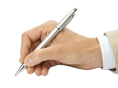 A hand holding a silver pen ready to write on a surface with a black isolated background behind it