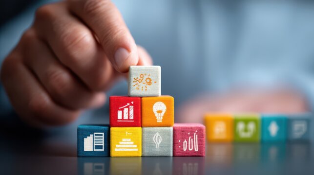 Colorful wooden blocks with icons representing growth and development.