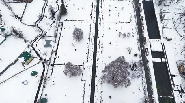 Drone footage showing Verinag spring carving its way through the quiet winter park landscape.