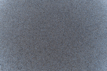 High-resolution close-up of natural beach sand texture. Ideal for use in backgrounds, design projects, digital textures, or nature-themed content. Minimal, clean, and versatile surface pattern.