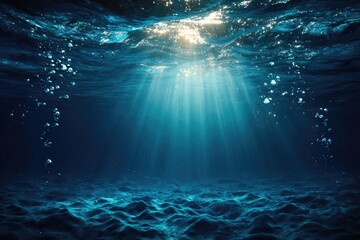 Sunbeams pierce dark, deep ocean