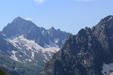 mountain peaks of the North Caucasus in Dombay on a sunny summer day