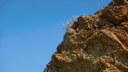 Rocks of the Mediterranean Sea in the port of the French city of Banyuls-sur-Mer, vacation in Europe, summer