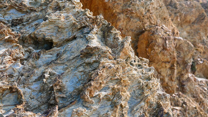 Rocks of the Mediterranean Sea in the port of the French city of Banyuls-sur-Mer, vacation in Europe, summer