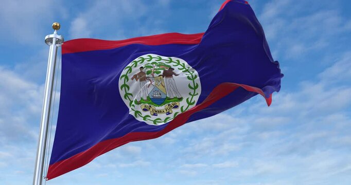 Belize flag with flagpole waving in wind, rolling clouds background looping, 4K video (Perfect Loop)