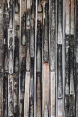 Unclean bamboo fence with mold