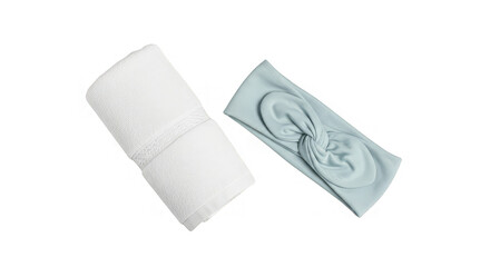 Elegant white towel and a stylish light blue knotted headband present a soft and peaceful ambiance.