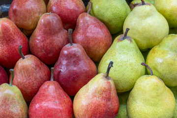 Ripe Juicy Pears at the Farmers Market. A Bountiful Harvest of Pears Celebrating Nature's Sweetness and Abundance. The Essence of Simplicity and Wholesomeness Found in Fresh Pears.