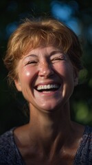 Joyful Woman Smiling Brightly in Nature with Sunlit Background