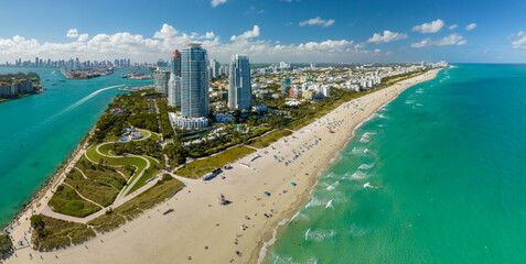 Travel destination and tourism infrastructure in southern USA. South Beach sandy surface with...