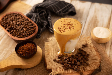 Dalgona Coffee, a cold, sweetened beverage made with milk and frothy coffee cream made with instant coffee, a trendy, refreshing, and easy recipe.