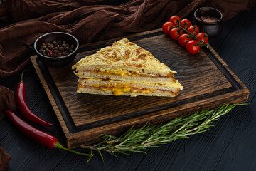 Bacon sandwich on a wooden tray