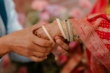 Chooda Ceremony – Traditional Indian Bridal Ritual Where Red and White Bangles Are Blessed and...