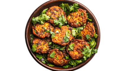Crispy vegetable pakoras arranged on a rustic ceramic plate isolated on white background 