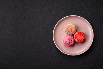 Chinese mooncake is an Asian sweet dessert. Asian mooncake as a background for your design