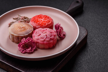 Chinese mooncake is an Asian sweet dessert. Asian mooncake as a background for your design