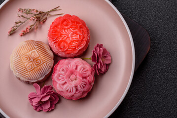 Chinese mooncake is an Asian sweet dessert. Asian mooncake as a background for your design