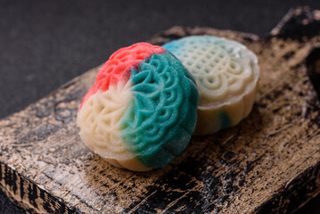 Chinese mooncake is an Asian sweet dessert. Asian mooncake as a background for your design