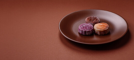 Chinese mooncake is an Asian sweet dessert. Asian mooncake as a background for your design