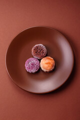 Chinese mooncake is an Asian sweet dessert. Asian mooncake as a background for your design